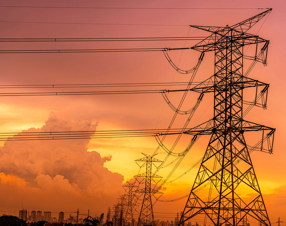 high-voltage-electric-pylons-and-transmission-lines-with-orange